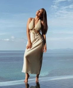 Trendy & Unique What's New Beach Vacation Backless Cut Out Frilled Halter Midi Dress - Beige