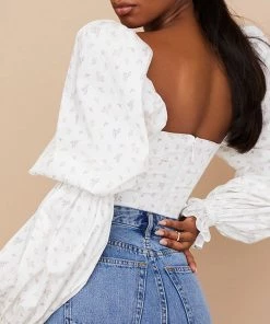 Trendy & Unique What's New Ditsy Printed Tied Front Bustier Puff Sleeve Crop Top - Floral 7 Trendy & Unique What's New Ditsy Printed Tied Front Bustier Puff Sleeve Crop Top - Floral