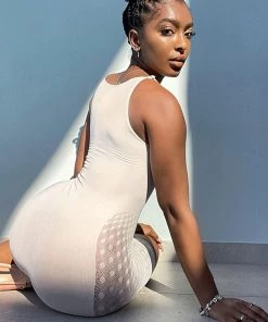 Trendy & Unique Sexy Polka Dot Rhinestone Trimmed Cut Out Mesh Sheer Romper - Teal What's New